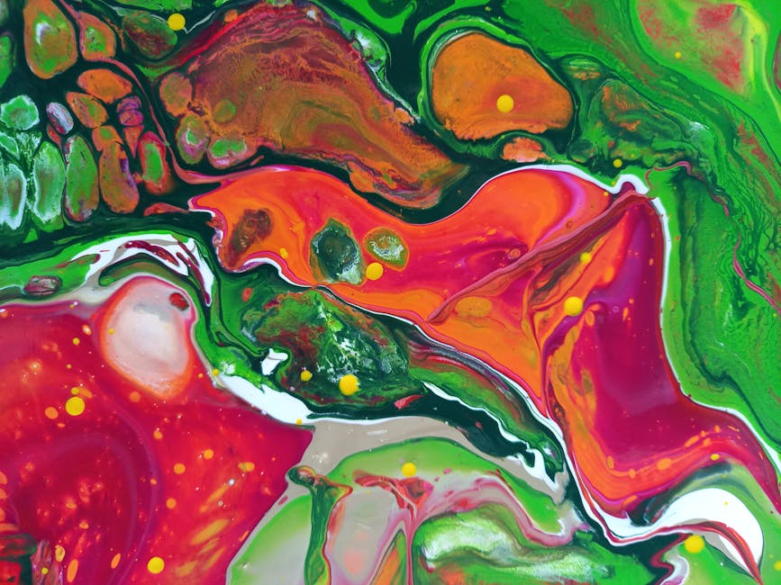 A dynamic and colorful abstract fluid art painting showcasing vibrant swirls and patterns.