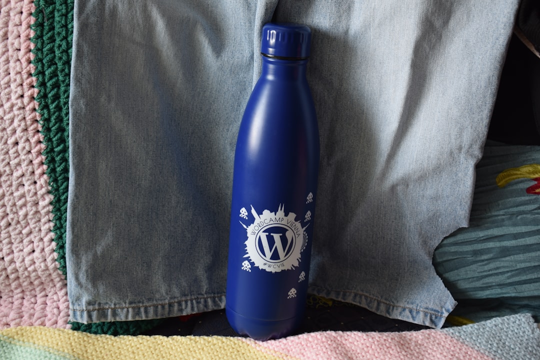 A blue water bottle is the main focus.